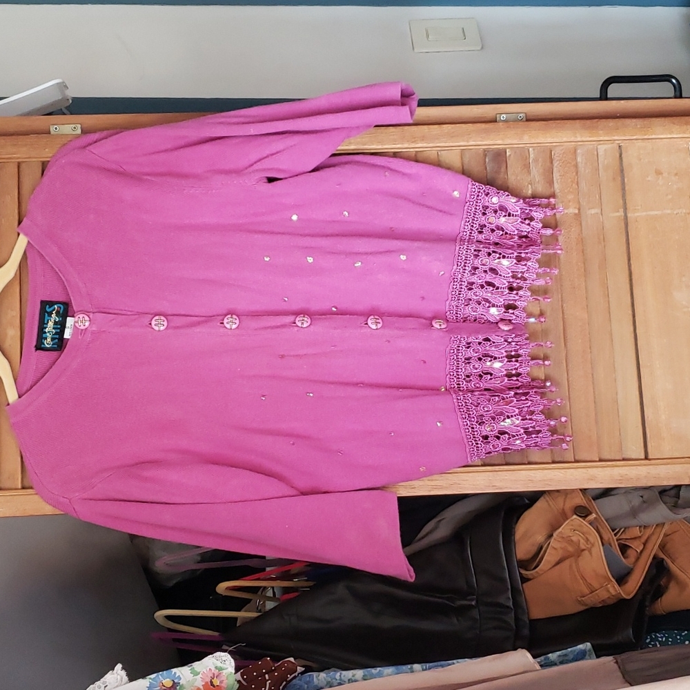 Deep pink knit cardigan with sequins and fancy trim on bottom with beading size